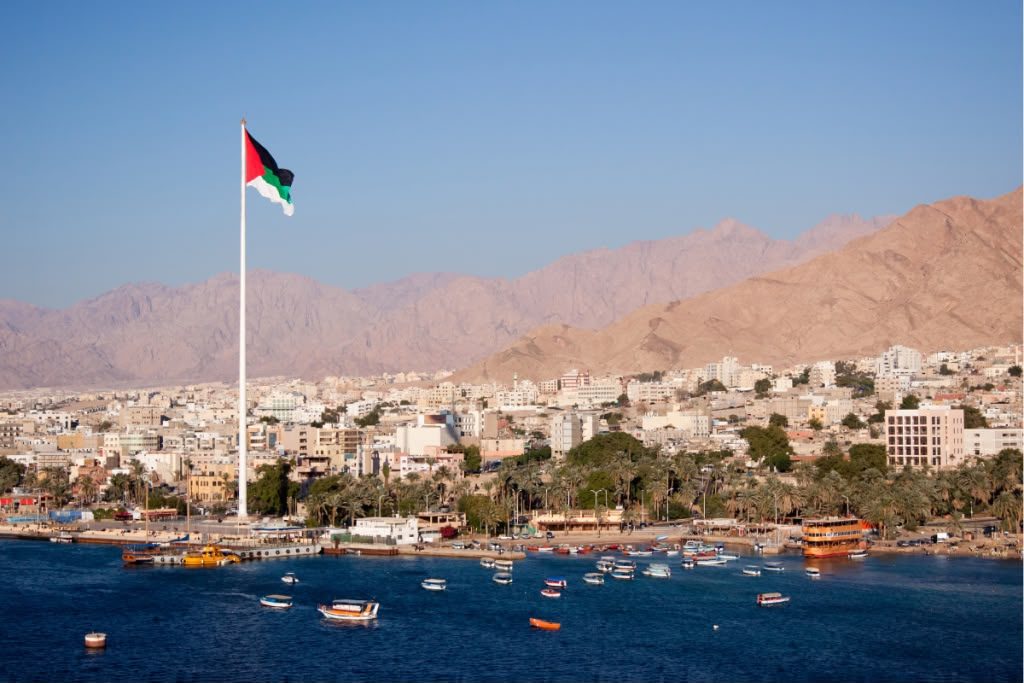 Aqaba on the Red Sea, with the Jordanian flag above the harbour